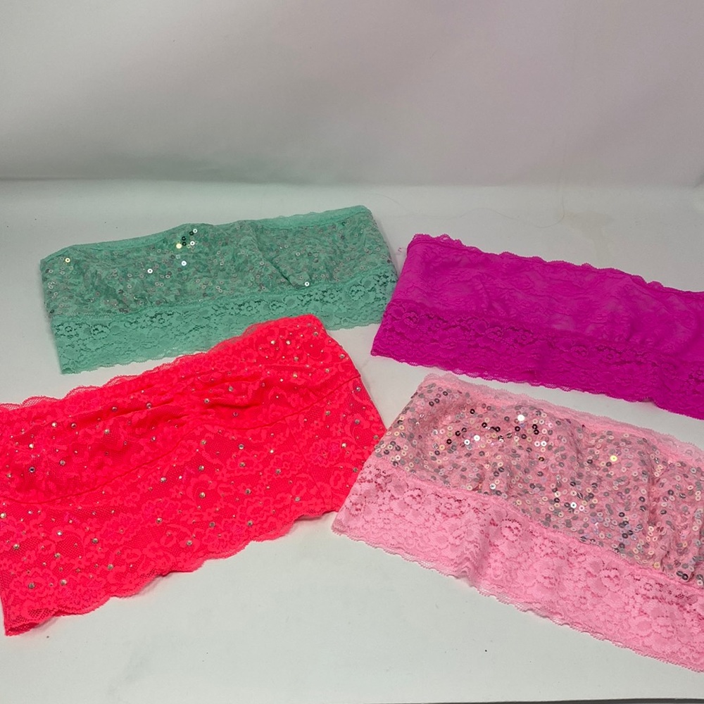 4 pink small bralettes